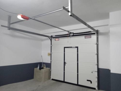 reparacion Seccionales 3 - Reparaci&oacute;n de Puertas de Garaje en Arganzuela Madrid