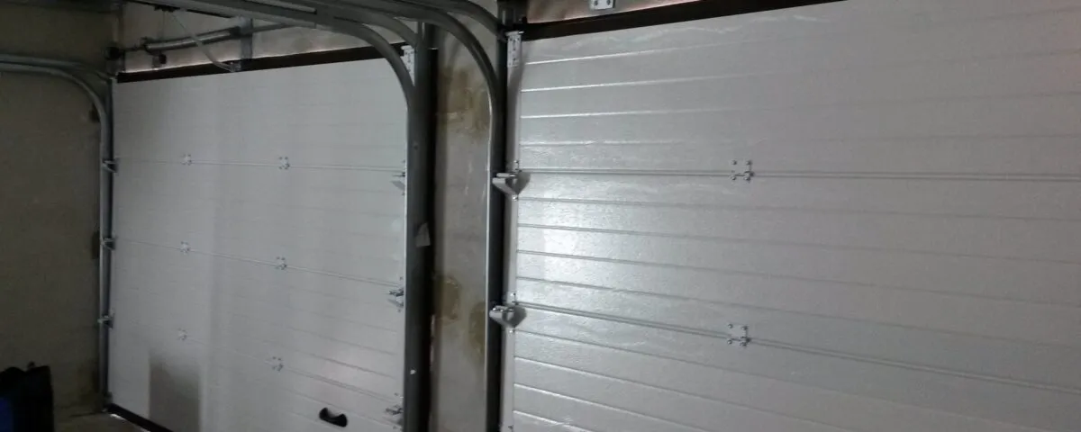 puertas seccionales 1200x480 - ¿Como Arreglar y Reparar Puertas de Garaje Seccionales?
