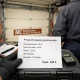 Presupuesto español de reparación de puerta basculante con total 245 €, junto a herramientas; Cuales son los mejores precios para servicios de reparacion de puertas de garaje basculantes